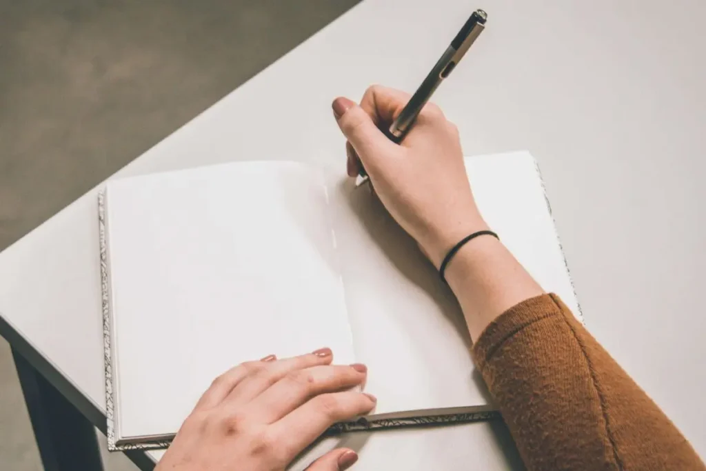 lady writing in a journal