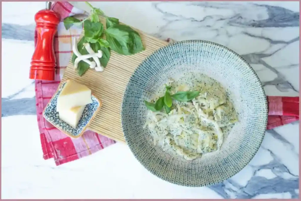 blue plate with beautifully plated pasta -creative self care ideas for empty nesters